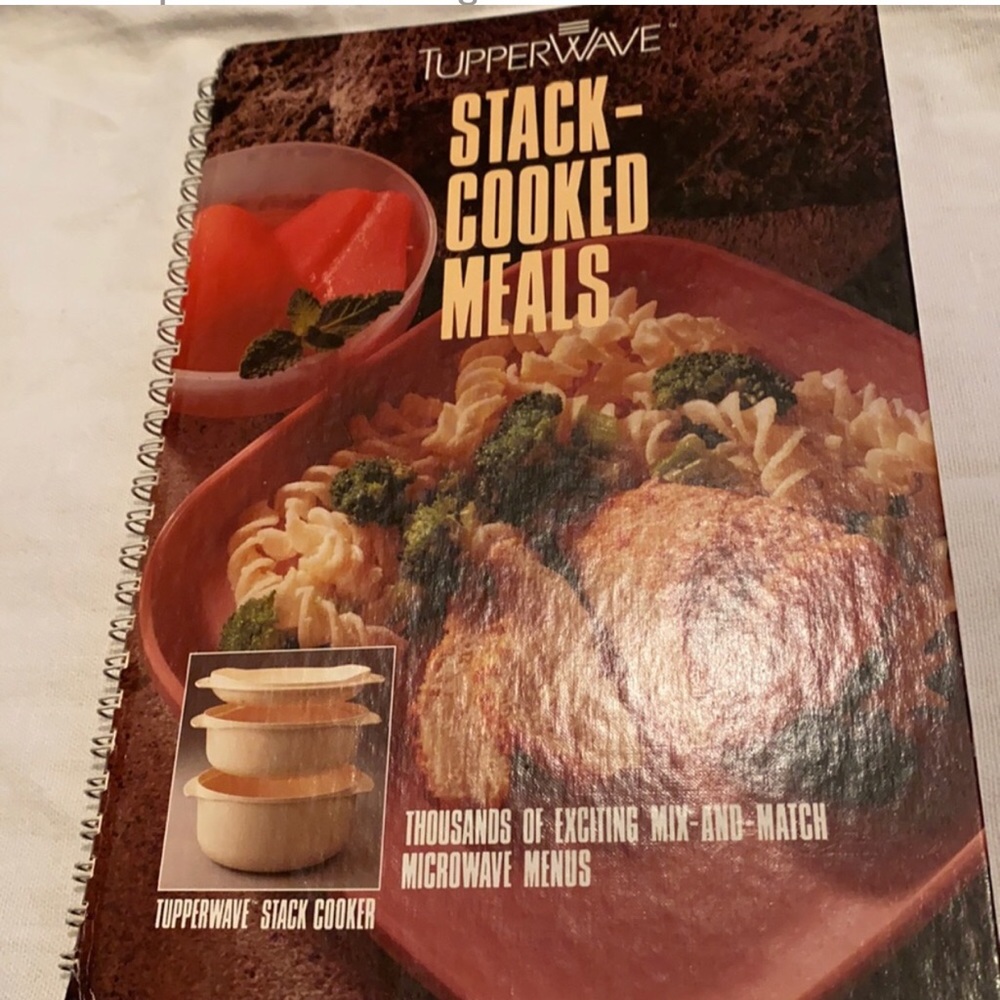 ~Tupperware~ Stack-Cooked Meals Hardcover Cookbook. 112 pages. Never used.